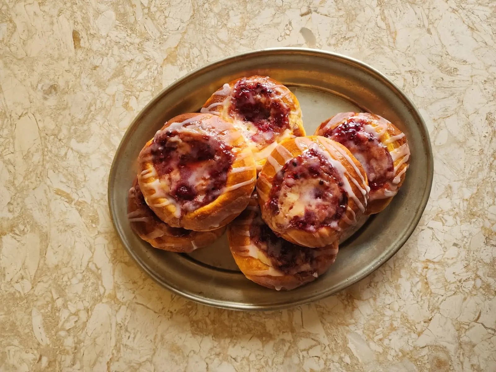Assortment of freshly baked cakes, cookies, and pastries